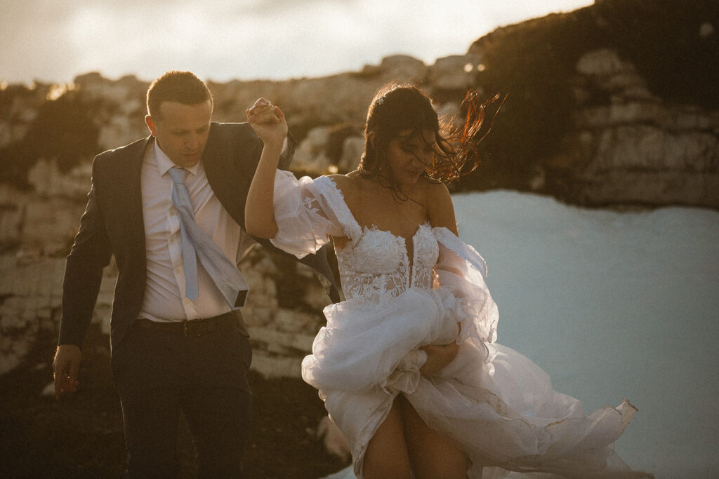 bride and groom hike in the Italian Dolomites