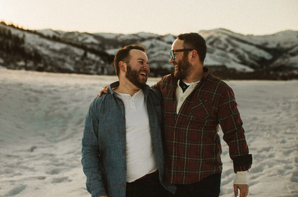 two men engaged in Park City, Utah in the snow 